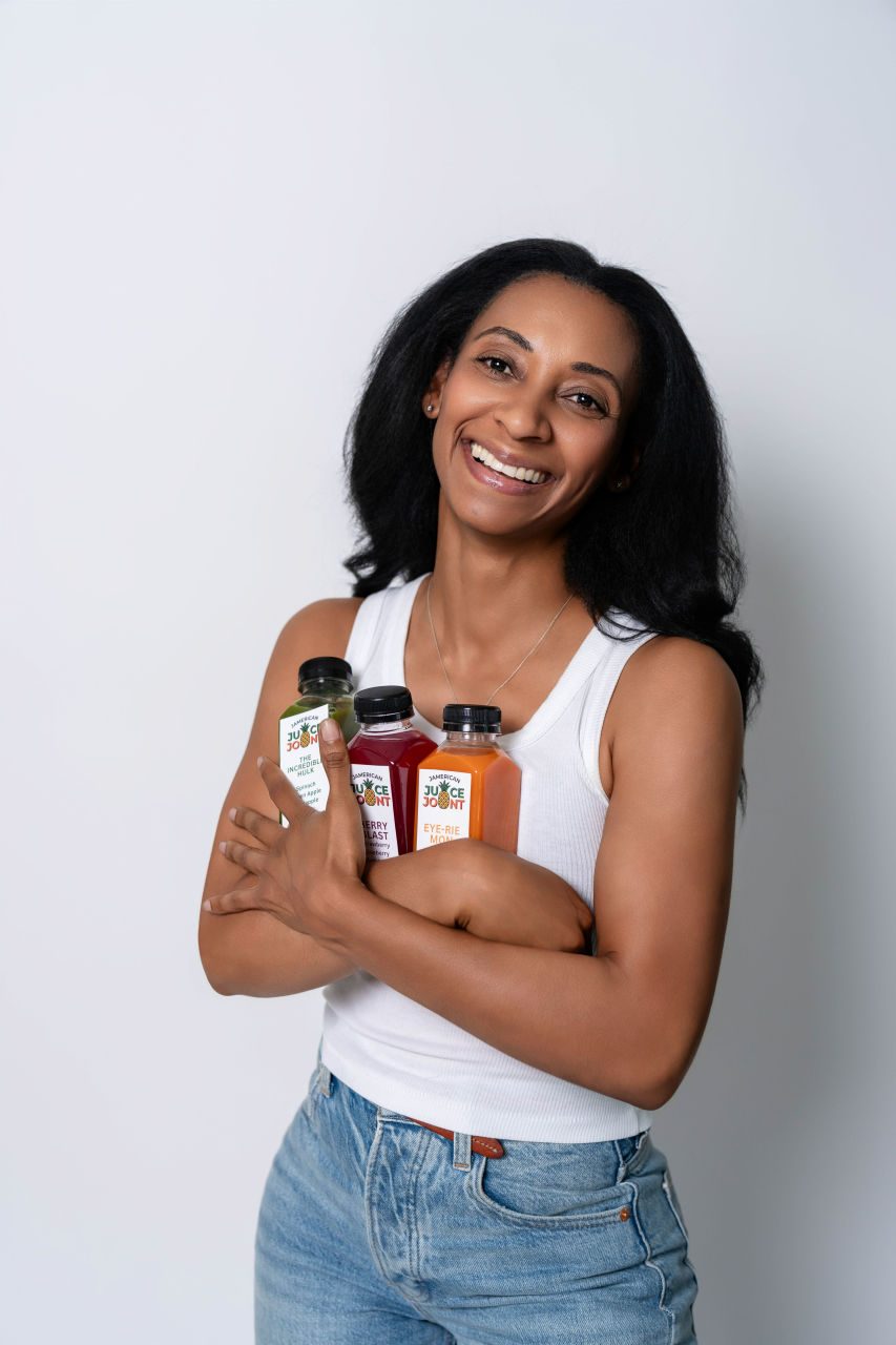 Jamerican Juice Joint founder with wellness shots